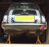 Mini Jacked up and Supported on Axle Stands with loose subframe